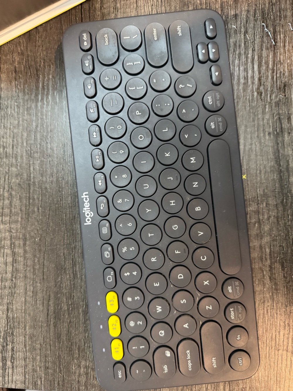 Logitech Black Wireless Keyboard with Yellow Function Key